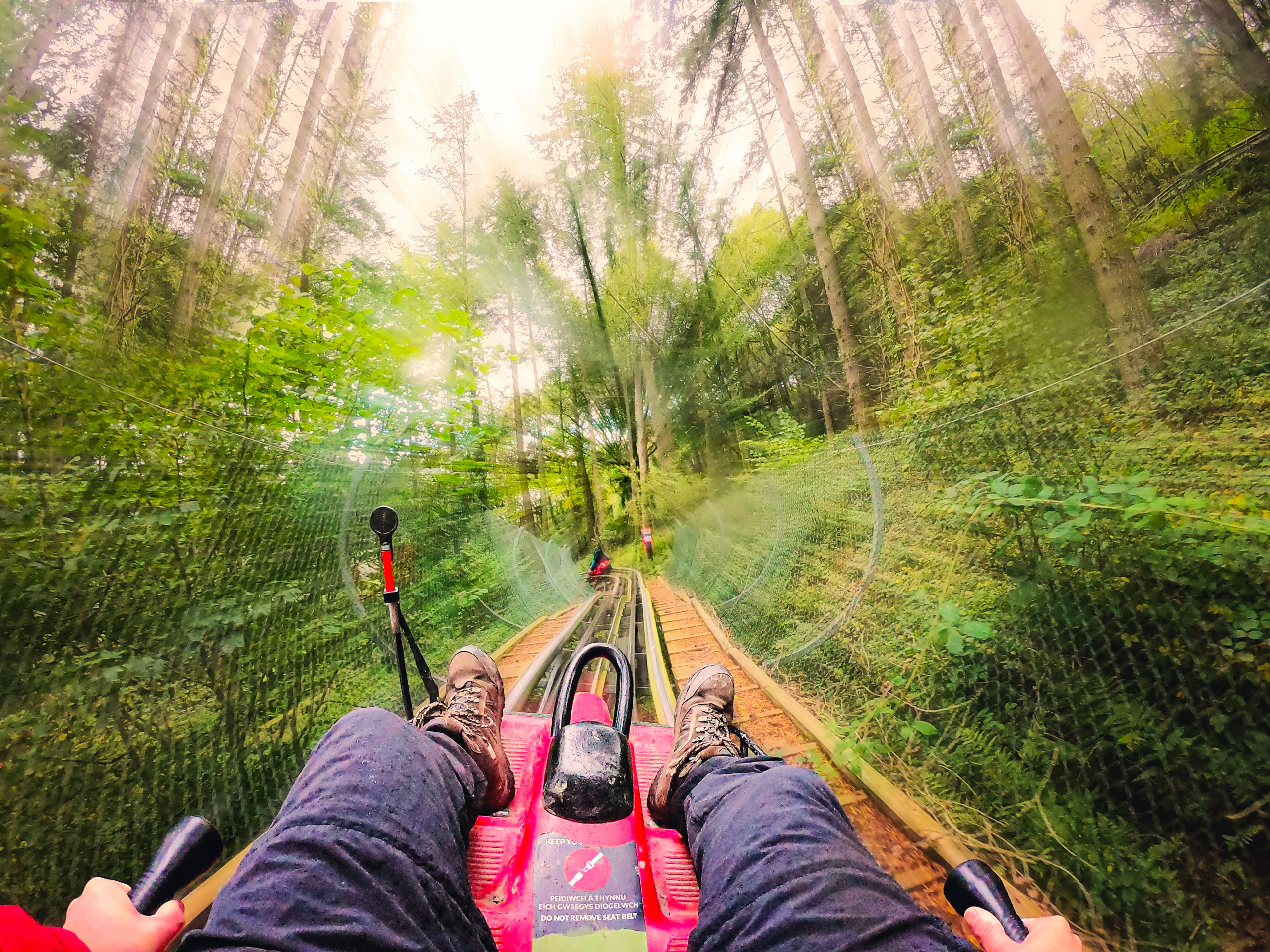 Manb riding the fforest coaster ride at Zip World in North Wales at Speed.