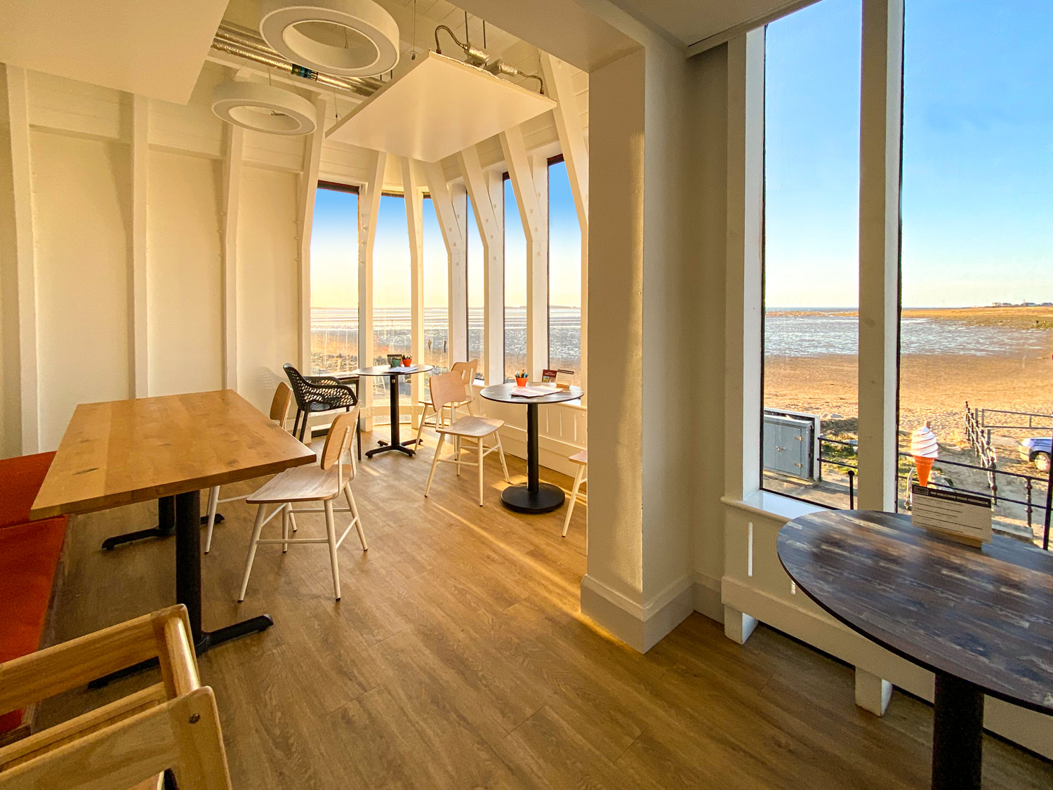 The Sail Loft Coastal Kitchen West Kirby inside dining looking out over the River Dee